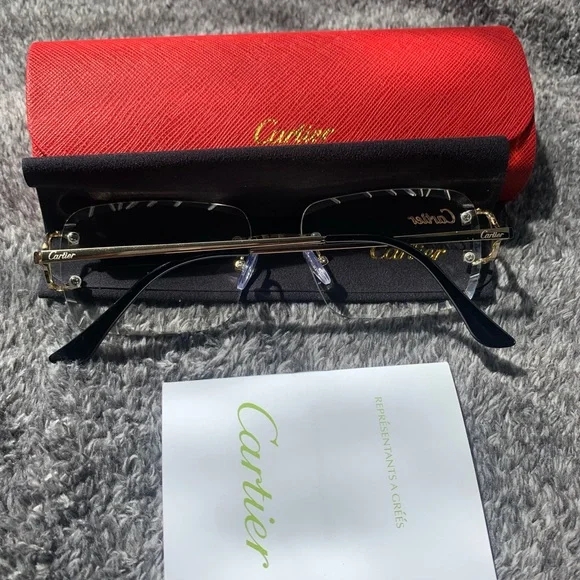 Cartier Gold and Black Rimless Glasses